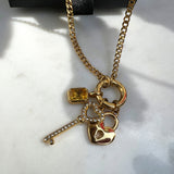 Charm glowing gold u. lås